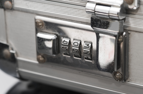 A briefcase with 3 dials